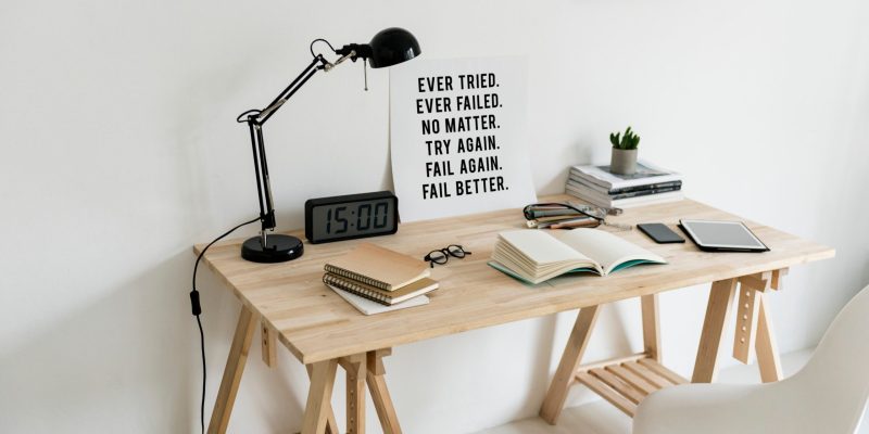 desk-setup-with-motivational-poster-scaled.jpg